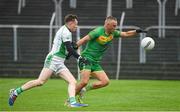 30 September 2023; Alan Quigley of Fighting Cocks in action against Sean Doyle of St Mullins during the Carlow Junior A Football Championship final match between Fighting Cocks GAA Club and St Mullins GAA Club at Netwatch Cullen Park in Carlow. Photo by Matt Browne/Sportsfile
