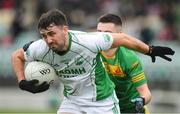 30 September 2023; Oisin Boland of St Mullins in action against Billy Nolan of Fighting Cocks during the Carlow Junior A Football Championship final match between Fighting Cocks GAA Club and St Mullins GAA Club at Netwatch Cullen Park in Carlow. Photo by Matt Browne/Sportsfile