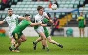 30 September 2023; Paidi O'Shea of St Mullins in action against Billy Nolan and Aaron Bolger of Fighting Cocks during the Carlow Junior A Football Championship final match between Fighting Cocks GAA Club and St Mullins GAA Club at Netwatch Cullen Park in Carlow. Photo by Matt Browne/Sportsfile