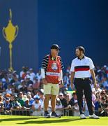 30 September 2023; Patrick Cantlay of USA with his caddie Joe LaCava on the seventh green during the afternoon fourball matches on day two of the 2023 Ryder Cup at Marco Simone Golf and Country Club in Rome, Italy. Photo by Brendan Moran/Sportsfile