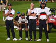 30 September 2023; Team USA players, from left, Collin Morikawa, Brian Harman, Justin Thomas and Max Homa watch as teammate Patrick Cantlay putts on the 18th gren during the afternoon fourball matches on day two of the 2023 Ryder Cup at Marco Simone Golf and Country Club in Rome, Italy. Photo by Brendan Moran/Sportsfile