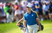 1 October 2023; Rory McIlroy of Europe walks up the second fairway during the singles matches on the final day of the 2023 Ryder Cup at Marco Simone Golf and Country Club in Rome, Italy. Photo by Ramsey Cardy/Sportsfile