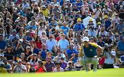 1 October 2023; Spectators watch as Rory McIlroy of Europe lines up a putt during the singles matches on the final day of the 2023 Ryder Cup at Marco Simone Golf and Country Club in Rome, Italy. Photo by Ramsey Cardy/Sportsfile