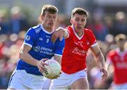 1 October 2023; John Heslin of St Loman's is tackled by Darren Giles of Coralstown-Kinnegad during the Westmeath County Senior Club Football Championship final match between St Loman's and Coralstown-Kinnegad at TEG Cusack Park in Mullingar, Westmeath. Photo by Ben McShane/Sportsfile