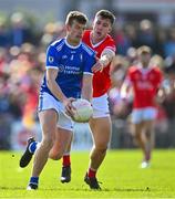 1 October 2023; John Heslin of St Loman's is tackled by Darren Giles of Coralstown-Kinnegad during the Westmeath County Senior Club Football Championship final match between St Loman's and Coralstown-Kinnegad at TEG Cusack Park in Mullingar, Westmeath. Photo by Ben McShane/Sportsfile