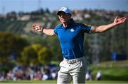 1 October 2023; Rory McIlroy of Europe celebrates a putt on the 15th hole during the singles matches on the final day of the 2023 Ryder Cup at Marco Simone Golf and Country Club in Rome, Italy. Photo by Ramsey Cardy/Sportsfile