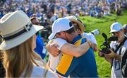 1 October 2023; Rory McIlroy of Europe with his wife Erica after beating Sam Burns of USA during the singles matches on the final day of the 2023 Ryder Cup at Marco Simone Golf and Country Club in Rome, Italy. Photo by Ramsey Cardy/Sportsfile