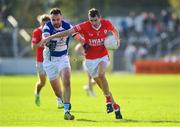 1 October 2023; Sean Gannon of Éire Óg in action against Cormac Walshe of Tinryland during the Carlow County Senior Club Football Championship final match between Tinryland and Éire Óg at Netwatch Cullen Park in Carlow. Photo by Matt Browne/Sportsfile