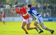 1 October 2023; Ross Dunphy of Éire Óg in action against Jonah Dunne of Tinryland during the Carlow County Senior Club Football Championship final match between Tinryland and Éire Óg at Netwatch Cullen Park in Carlow. Photo by Matt Browne/Sportsfile