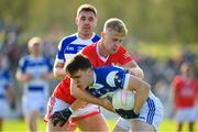 1 October 2023; Jonah Dunne of Tinryland in action against Ross Dunphy of Éire Óg during the Carlow County Senior Club Football Championship final match between Tinryland and Éire Óg at Netwatch Cullen Park in Carlow. Photo by Matt Browne/Sportsfile