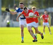 1 October 2023; Sean Gannon of Éire Óg in action against Cormac Walshe of Tinryland during the Carlow County Senior Club Football Championship final match between Tinryland and Éire Óg at Netwatch Cullen Park in Carlow. Photo by Matt Browne/Sportsfile