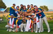 1 October 2023; Team Europe captain Luke Donald, centre, with the Ryder cup alongside his team, back row, from left, Ludvig Åberg, Robert MacIntyre, Jon Rahm, Shane Lowry, Nicolai Højgaard, Sepp Straka, Viktor Hovland, front row, from left, Tyrrell Hatton, Matt Fitzpatrick, Rory McIlroy, Justin Rose and Tommy Fleetwood during the singles matches on the final day of the 2023 Ryder Cup at Marco Simone Golf and Country Club in Rome, Italy. Photo by Brendan Moran/Sportsfile