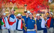 1 October 2023; Europe captain Luke Donald lifts the trophy after the final day of the 2023 Ryder Cup at Marco Simone Golf and Country Club in Rome, Italy. Photo by Ramsey Cardy/Sportsfile