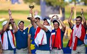 1 October 2023; Rory McIlroy of Europe lifts the trophy after the final day of the 2023 Ryder Cup at Marco Simone Golf and Country Club in Rome, Italy. Photo by Ramsey Cardy/Sportsfile