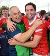 1 October 2023; Éire Óg manager Turlough O'Brien celebrates with Benny Kavanagh after the Carlow County Senior Club Football Championship final match between Tinryland and Éire Óg at Netwatch Cullen Park in Carlow. Photo by Matt Browne/Sportsfile