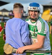 1 October 2023; TJ Reid of Shamrocks Ballyhale celebrates with a supporter after his side's victory in the Kilkenny County Senior Hurling Championship quarter-final match between Shamrocks Ballyhale and Dicksboro at UPMC Nowlan Park in Kilkenny. Photo by Tyler Miller/Sportsfile