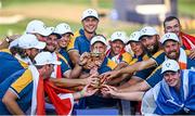 1 October 2023; Europe captain Luke Donald and his players celebrate with the trophy after the final day of the 2023 Ryder Cup at Marco Simone Golf and Country Club in Rome, Italy. Photo by Ramsey Cardy/Sportsfile