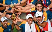 1 October 2023; Europe players from left, Matt Fitzpatrick, Rory McIlroy, Justin Rose and Tommy Fleetwood, with the trophy after the final day of the 2023 Ryder Cup at Marco Simone Golf and Country Club in Rome, Italy. Photo by Ramsey Cardy/Sportsfile