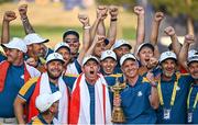 1 October 2023; Europe captain Luke Donald with players, including Tyrrell Hatton and Rory McIlroy, celebrate with backroom staff after the final day of the 2023 Ryder Cup at Marco Simone Golf and Country Club in Rome, Italy. Photo by Ramsey Cardy/Sportsfile