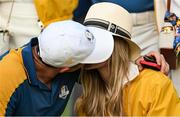 1 October 2023; Rory McIlroy of Europe kisses his wife Erica Stoll while celebrating after the singles matches on the final day of the 2023 Ryder Cup at Marco Simone Golf and Country Club in Rome, Italy. Photo by Brendan Moran/Sportsfile