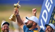 1 October 2023; Jon Rahm of Europe celebrates with the Ryder Cup after the final day of the 2023 Ryder Cup at Marco Simone Golf and Country Club in Rome, Italy. Photo by Brendan Moran/Sportsfile