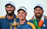 1 October 2023; Europe captain Luke Donald, Jon Rahm, left, and Shane Lowry with the Ryder Cup after the final day of the 2023 Ryder Cup at Marco Simone Golf and Country Club in Rome, Italy. Photo by Brendan Moran/Sportsfile