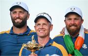 1 October 2023; Europe captain Luke Donald, Jon Rahm, left, and Shane Lowry with the Ryder Cup after the final day of the 2023 Ryder Cup at Marco Simone Golf and Country Club in Rome, Italy. Photo by Brendan Moran/Sportsfile