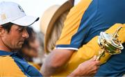 1 October 2023; Viktor Hovland of Europe examines the detail on the Ryder Cup after the final day of the 2023 Ryder Cup at Marco Simone Golf and Country Club in Rome, Italy. Photo by Brendan Moran/Sportsfile