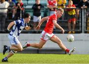 1 October 2023; Ross Dunphy of Éire Óg in action against Jonah Dunne of Tinryland during the Carlow County Senior Club Football Championship final match between Tinryland and Éire Óg at Netwatch Cullen Park in Carlow. Photo by Matt Browne/Sportsfile