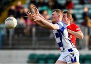 1 October 2023; Conor Ryan of Tinryland in action against Sean Gannon of Éire Óg during the Carlow County Senior Club Football Championship final match between Tinryland and Éire Óg at Netwatch Cullen Park in Carlow. Photo by Matt Browne/Sportsfile