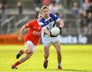 1 October 2023; Paul Broderick of Tinryland in action against Reece Denieffe of Éire Óg during the Carlow County Senior Club Football Championship final match between Tinryland and Éire Óg at Netwatch Cullen Park in Carlow. Photo by Matt Browne/Sportsfile