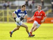 1 October 2023; Paul Broderick of Tinryland in action against Reece Denieffe of Éire Óg during the Carlow County Senior Club Football Championship final match between Tinryland and Éire Óg at Netwatch Cullen Park in Carlow. Photo by Matt Browne/Sportsfile