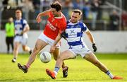 1 October 2023; Benny Kavanagh of Éire Óg in action against Conor Carew of Tinryland during the Carlow County Senior Club Football Championship final match between Tinryland and Éire Óg at Netwatch Cullen Park in Carlow. Photo by Matt Browne/Sportsfile