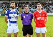 1 October 2023; Referee Paud O'Dwyer with Tinryland captain Shane Redmond and Éire Óg captain Jordan Morrissey before the Carlow County Senior Club Football Championship final match between Tinryland and Éire Óg at Netwatch Cullen Park in Carlow. Photo by Matt Browne/Sportsfile