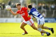 1 October 2023; Ross Dunphy of Éire Óg in action against Jonah Dunne of Tinryland during the Carlow County Senior Club Football Championship final match between Tinryland and Éire Óg at Netwatch Cullen Park in Carlow. Photo by Matt Browne/Sportsfile