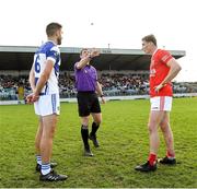 1 October 2023; Referee Paud O'Dwyer with Tinryland captain Shane Redmond and Éire Óg captain Jordan Morrissey before the Carlow County Senior Club Football Championship final match between Tinryland and Éire Óg at Netwatch Cullen Park in Carlow. Photo by Matt Browne/Sportsfile