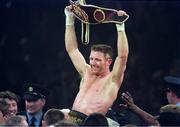 18 March 1995; Steve Collins of Ireland is held aloft with his WBO Super-Middleweight belt after a points victory over the reigning champion Chris Eubank after the WBO World Super-Middleweight Title fight at the Green Glens Arena Millstreet in Cork, Ireland. Photo by David Maher/Sportsfile