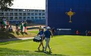 1 October 2023; Shane Lowry of Europe and his caddy Darren Reynolds make thir way down the seventh fairway during the singles matches on the final day of the 2023 Ryder Cup at Marco Simone Golf and Country Club in Rome, Italy. Photo by Brendan Moran/Sportsfile