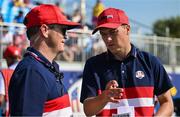 1 October 2023; Jordan Spieth of USA discusses options with USA captain Zach Johnson on the seventh tee box during the singles matches on the final day of the 2023 Ryder Cup at Marco Simone Golf and Country Club in Rome, Italy. Photo by Brendan Moran/Sportsfile