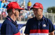 1 October 2023; Jordan Spieth of USA discusses options with USA captain Zach Johnson on the seventh tee box during the singles matches on the final day of the 2023 Ryder Cup at Marco Simone Golf and Country Club in Rome, Italy. Photo by Brendan Moran/Sportsfile