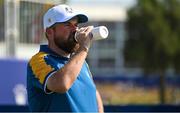 1 October 2023; Shane Lowry of Europe takes a drink of water on the seventh tee box during the singles matches on the final day of the 2023 Ryder Cup at Marco Simone Golf and Country Club in Rome, Italy. Photo by Brendan Moran/Sportsfile