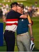 1 October 2023; USA captain Zach Johnson congratulates Europe captain Luke Donald after the final day of the 2023 Ryder Cup at Marco Simone Golf and Country Club in Rome, Italy. Photo by Brendan Moran/Sportsfile