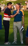 1 October 2023; USA captain Zach Johnson congratulates Europe captain Luke Donald after the final day of the 2023 Ryder Cup at Marco Simone Golf and Country Club in Rome, Italy. Photo by Brendan Moran/Sportsfile