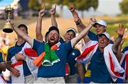 1 October 2023; Shane Lowry of Europe celebrates alongside teammate Rory McIlroy as he lifts the Ryder Cup after the final day of the 2023 Ryder Cup at Marco Simone Golf and Country Club in Rome, Italy. Photo by Brendan Moran/Sportsfile