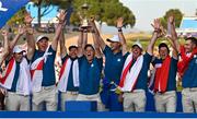 1 October 2023; Europe captain Luke Donald and his players celebrate as they lift the Ryder Cup after the final day of the 2023 Ryder Cup at Marco Simone Golf and Country Club in Rome, Italy. Photo by Brendan Moran/Sportsfile