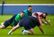 3 October 2023; Jonathan Sexton, James Lowe and Caelan Doris laugh as Dave Kilcoyne wears a jersey presented by the police during an Ireland Rugby squad training session at Complexe de la Chambrerie in Tours, France. Photo by Harry Murphy/Sportsfile
