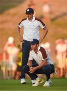 30 September 2023; Rory McIlroy, right, and Matt Fitzpatrick of Europe on the 17th green during the afternoon fourball matches on day two of the 2023 Ryder Cup at Marco Simone Golf and Country Club in Rome, Italy. Photo by Brendan Moran/Sportsfile