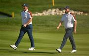 30 September 2023; Shane Lowry, right, and Sepp Straka of Europe on the 16th green during the morning foursomes on day two of the 2023 Ryder Cup at Marco Simone Golf and Country Club in Rome, Italy. Photo by Brendan Moran/Sportsfile