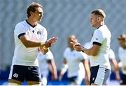 6 October 2023; Jamie Ritchie and Finn Russell play rock, paper, scissors during the Scotland rugby captain's run at the Stade de France in Paris, France. Photo by Harry Murphy/Sportsfile