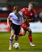 6 October 2023; Johannes Yli-Kokko of Dundalk is tackled by Harry Wood of Shelbourne during the SSE Airtricity Men's Premier Division match between Shelbourne and Dundalk at Tolka Park in Dublin. Photo by Stephen McCarthy/Sportsfile